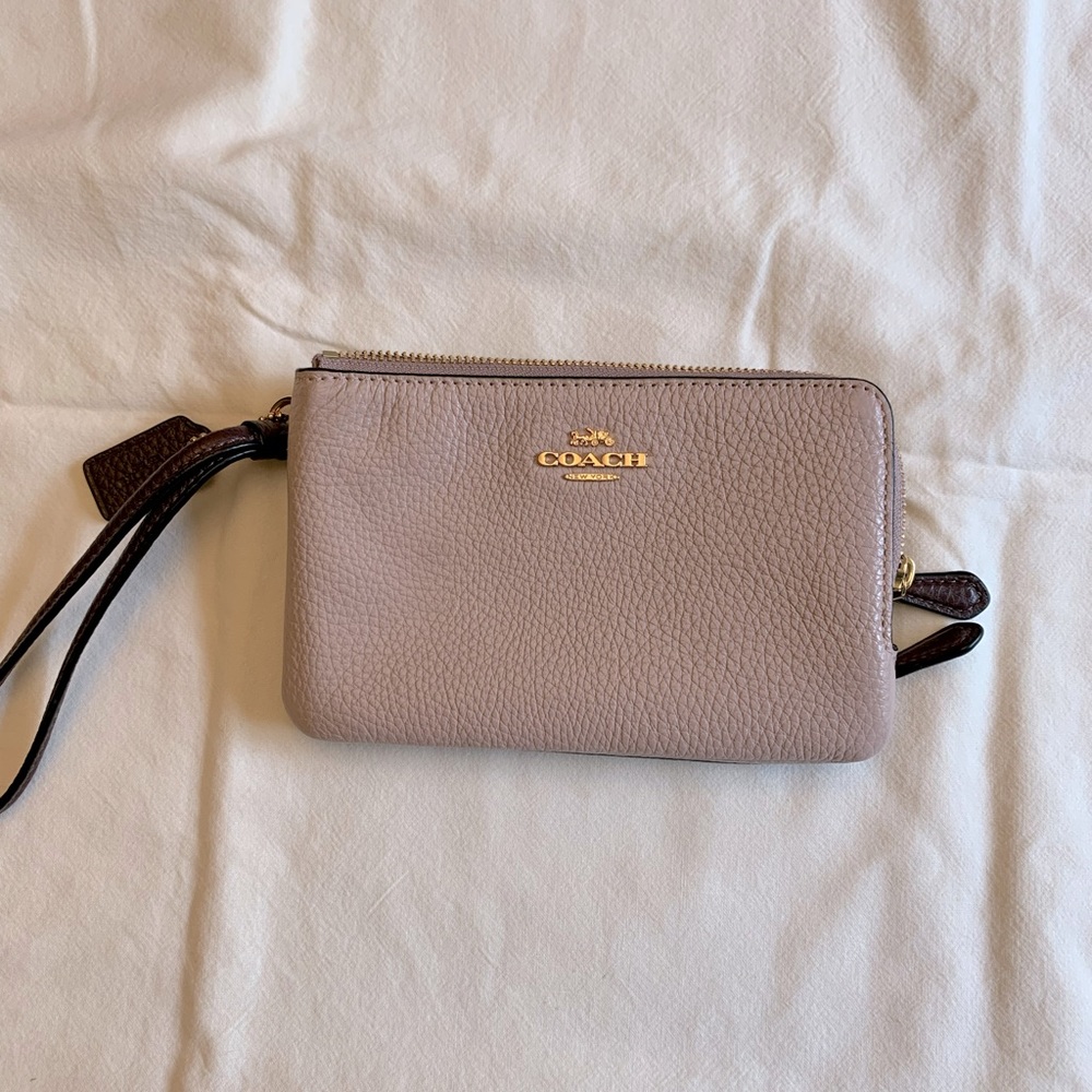 GUC Coach brand wristlet